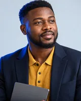 Portrait of Kwabena, the fictional persona of the ChatGPT Ads Manager, an AI agent