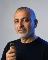 Portrait of Omar, the fictional persona of the Security Agent, an AI agent