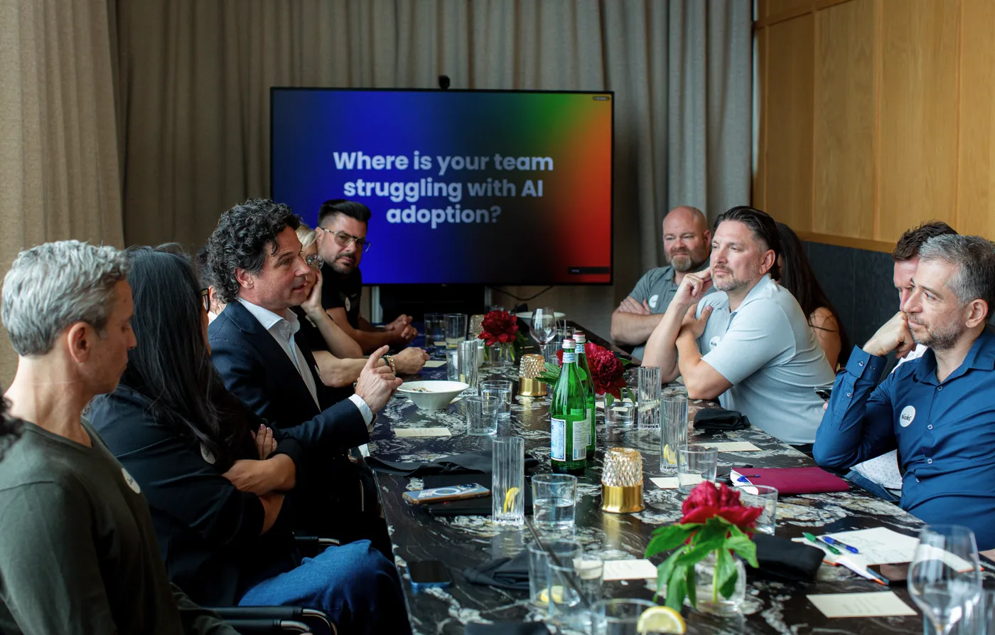Business owners at a MyZone AI roundtable discussing where their teams struggle with AI adoption